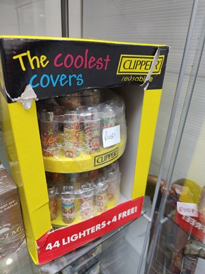 Lot 98 - Clipper reusable lighters on display stand