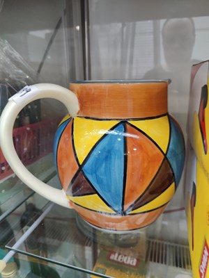 Lot 101 - Decorative jug bearing claris cliff logos