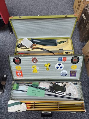 Lot 25 - 2 cases containing target shooting archery bow and arrows with accessories