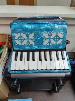 Lot 19 - Blue small accordion with carry case