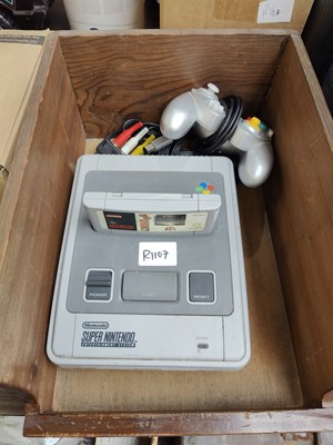 Lot 18 - Nintendo super Nintendo console with random controller