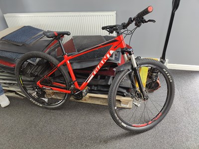 Lot 244 - Giant red mountain bike