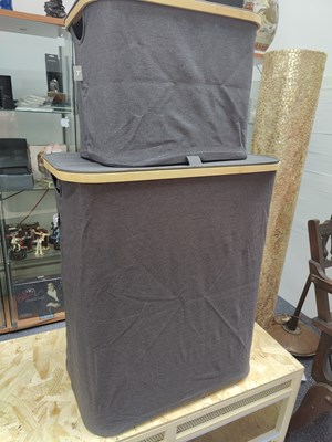 Lot 131 - 2 grey fabric and wood laundry baskets