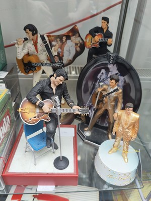 Lot 106 - Collection of Elvis figures on display stands