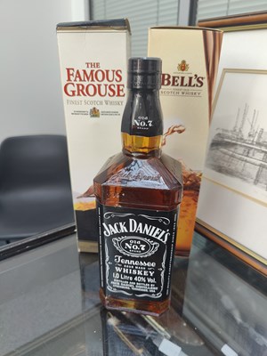 Lot 184 - 3 Bottles of Whisky consisting of famous grouse, bells and jack daniels