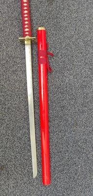 Lot 162 - Samurai sword with square hilt in bright red sheath