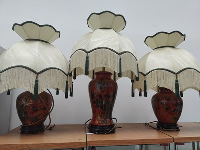 Lot 83 - 3 red decorative lamps with matching shades