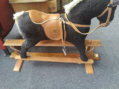 Lot 116 - Rocking horse in classic swing style
