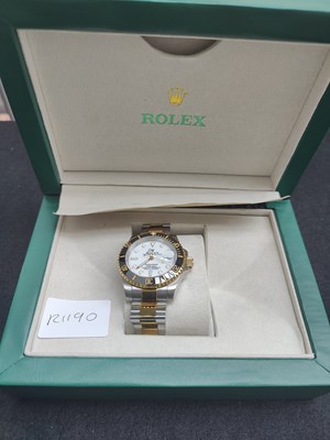 Lot 149 - Watch in display box bearing rolex logos