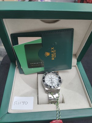 Lot 146 - Watch in display box bearing rolex logos