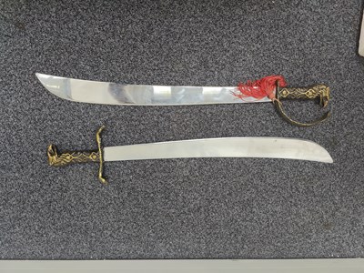 Lot 128 - 2 brass handle swords in martial arts style