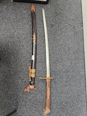 Lot 157 - Decorative japanese dragon sword with scabbard