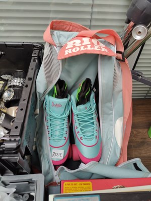 Lot 187 - Kids roller skates in bag with spare wheels