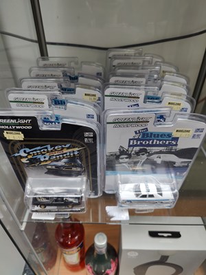 Lot 111 - Qty of greenlight vehicles including blues brothers and Smokey and the bandit