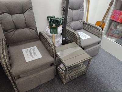 Lot 57 - Reclining pair of garden chairs with matching side table
