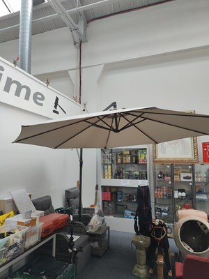 Lot 59 - Large parasol with fitted base and adjustable height