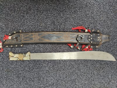 Lot 159 - Machete with coin set in resin handle in leather sheath