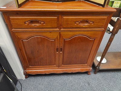 Lot 116 - Hardwood Cabinet with detailing around handles very heavy item