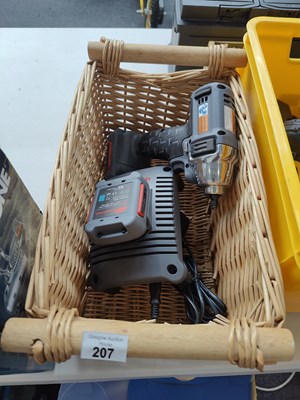 Lot 207 - Impact driver and charger