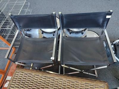 Lot 278 - Pair of 1970's Robert kier Jacobsen chrome black chrectio chairs with damaged to a seat