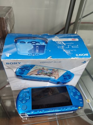 Lot 110 - Sony PSP in vibrant blue with box