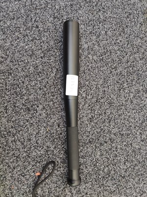 Lot 168 - Black torch in bat style