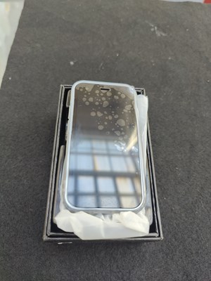 Lot 186 - Small mobile phone in box