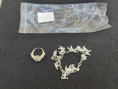 Lot 195 - Silver ring and charm bracelet