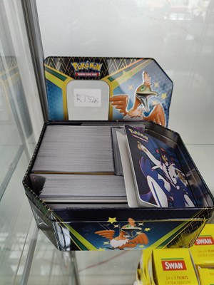 Lot 100 - Qty of Pokemon cards shining fates in tin