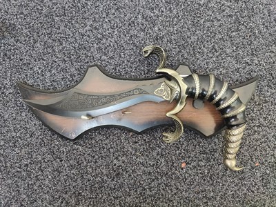 Lot 172 - Decorative fantasy knife with wall plaque