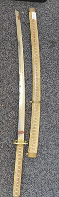 Lot 173 - Decorative samurai sword with snakeskin effect sheath and hilt