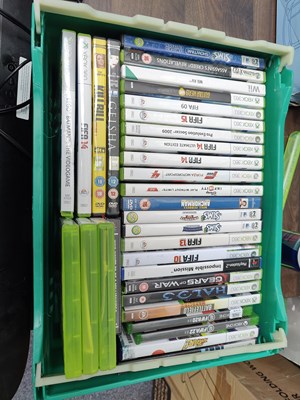 Lot 24 - Box containing assorted games and dvds