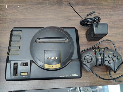 Lot 40 - Sega mega drive with power cable and controller